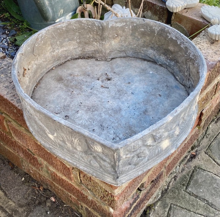 Lot 200: Antique Heart Lead Planter | Heavy Solid Lead Trough | Cherub & Dog Frieze