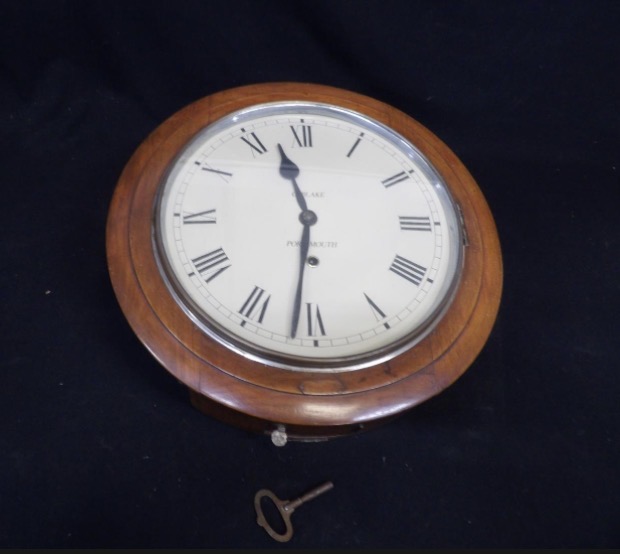 Lot 022: Mahogany Cased Wall Clock with Key