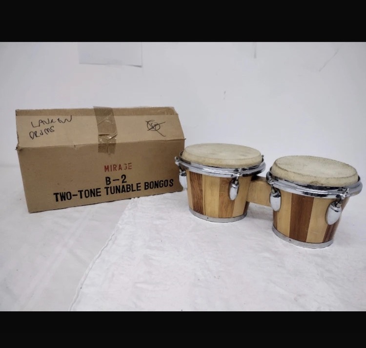 Lot 148: Pair of Mirage B-2 Two-Tone Tunable Bongo Drums — Original Box