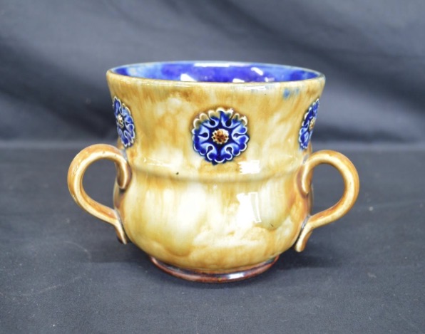 Lot 020: Royal Doulton Stoneware Tyg with Blue Flower Motif