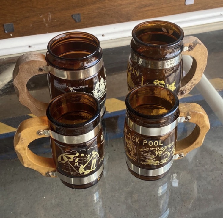 Lot 095: Set of Four 1960s Amber Glass Barrel Mugs — Cape Cod, London, Blackpool