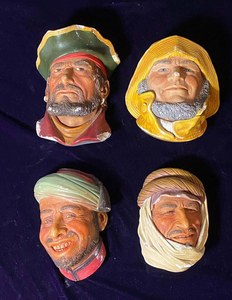 Lot 047: Set of Four 1970s Chalkware Wall Plaques — Nautical & Middle Eastern Figures