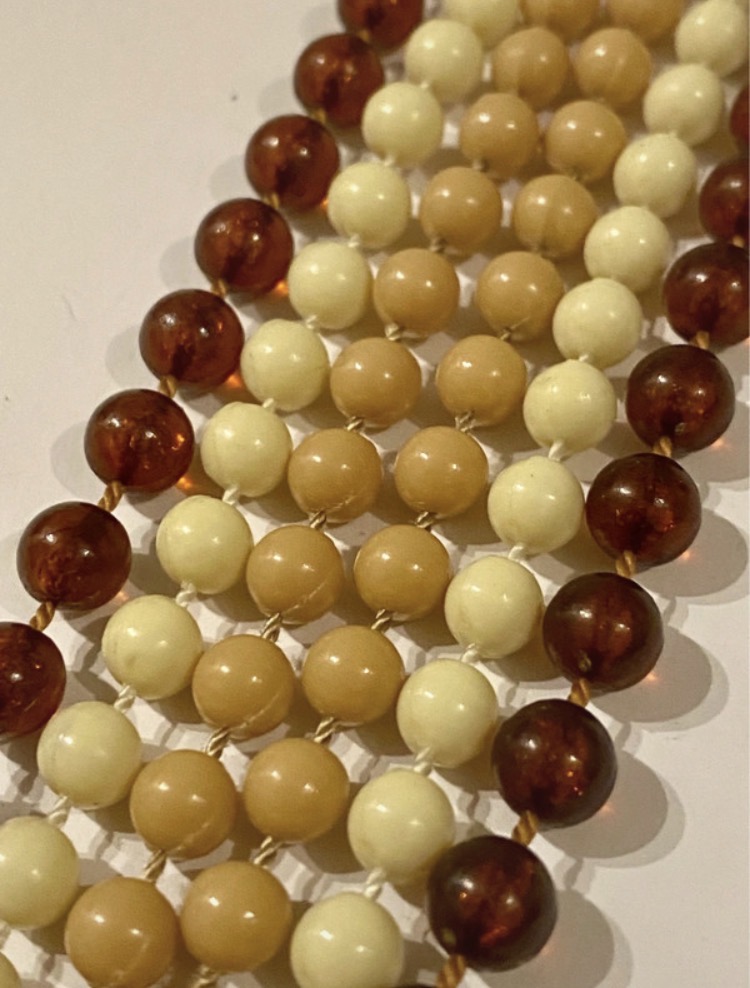 Lot 116: Set of Three Mid-Century Bead Necklaces — Cream, Mottled Brown & Amber