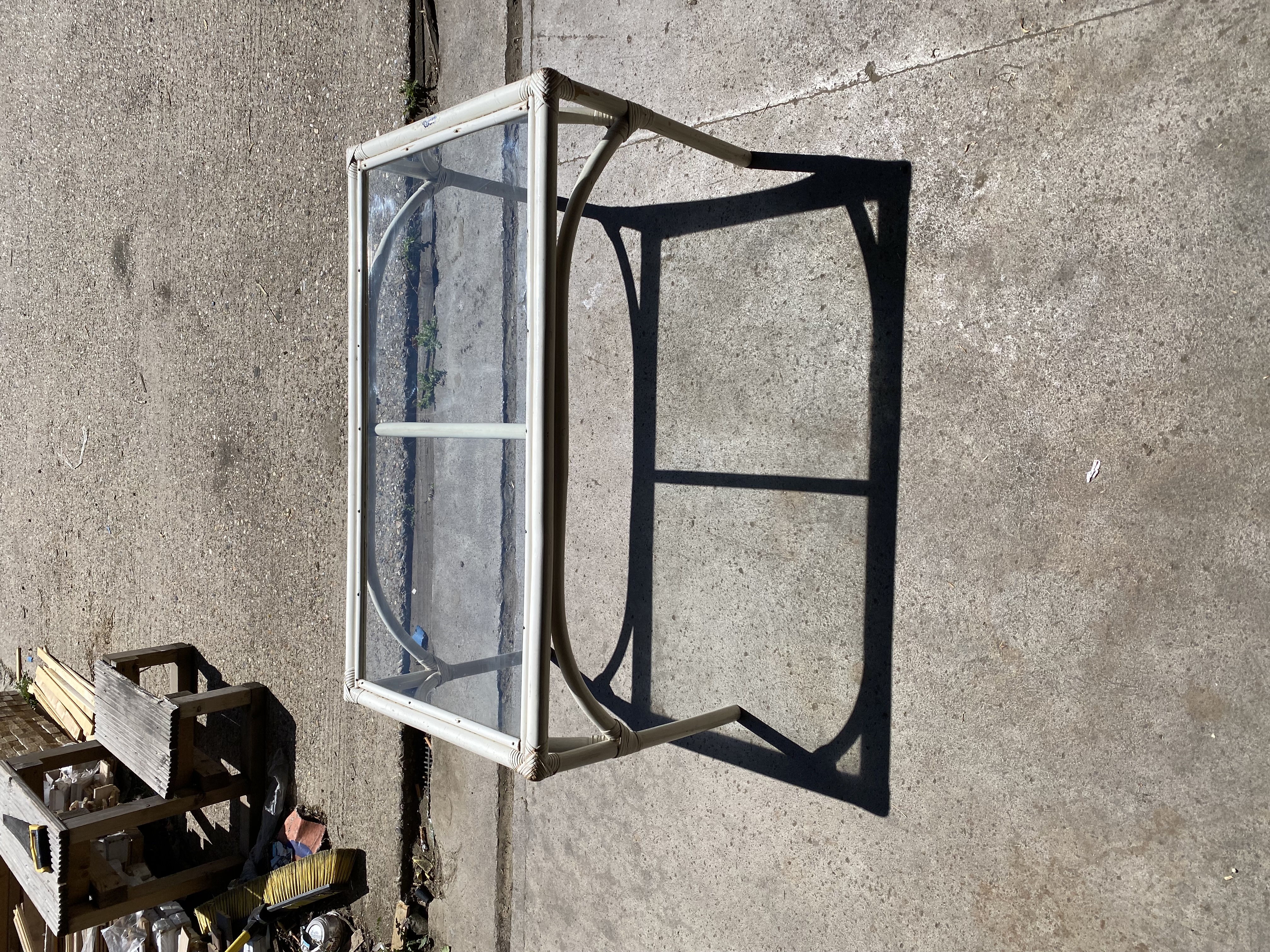 Lot 197: Vintage Boho Rattan Cane Glass Coffee Table (92x51x43cm)