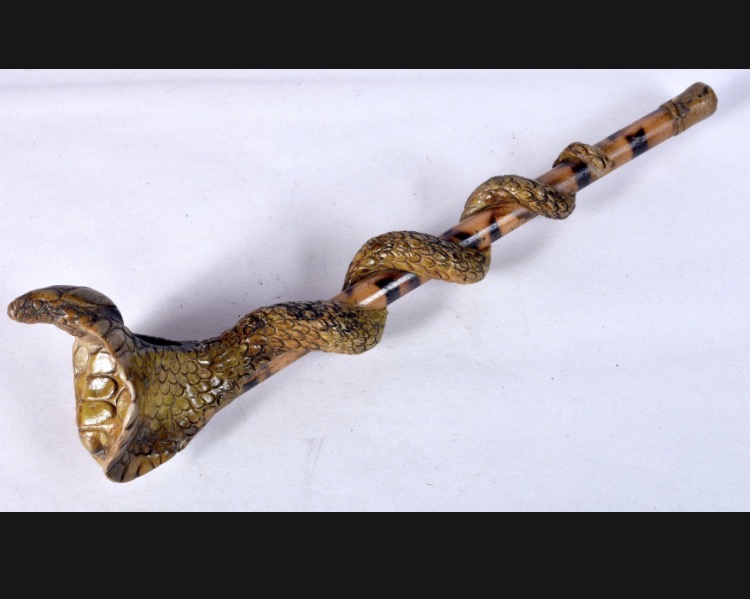 Lot 159: Vintage Snake Wrapped Clay and Bamboo Pipe — 22 cm Long